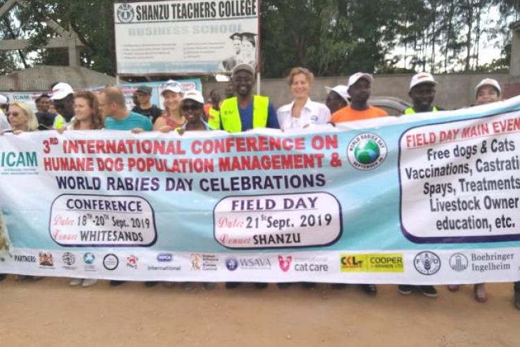 ICAM banner held outside Shanzu Teachers College